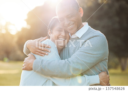 Nature, smile and senior couple hugging with love, care and romance on a date in outdoor park. Happy, laughing and elderly man and woman in retirement embracing, talking and bonding together in field Nature, smile and senior couple hugging with love, care and romance on a date in outdoor park. Happy, laughing and elderly man and woman in retirement embracing, talking and bonding together in field 137548626