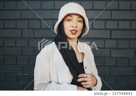 Beauty, fashion and portrait of woman in city with trendy clothes, cool accessories and style. Travel, cosmetics and person on wall background outdoors for holiday, vacation and weekend in urban town Beauty, fashion and portrait of woman in city with trendy clothes, cool accessories and style. Travel, cosmetics and person on wall background outdoors for holiday, vacation and weekend in urban town 137548641