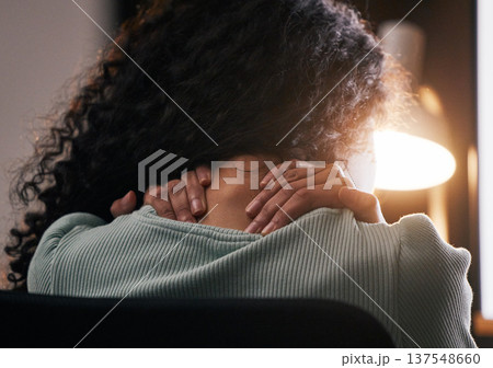 Neck pain, back and woman with stress, anxiety and work burnout in office at night. Tired, massage and muscle injury and female professional hand with tension and health problem of a worker shoulder Neck pain, back and woman with stress, anxiety and work burnout in office at night. Tired, massage and muscle injury and female professional hand with tension and health problem of a worker shoulder 137548660