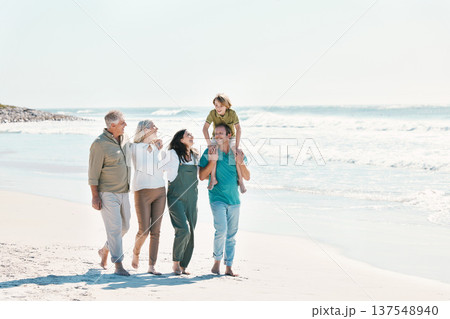 Relax, travel and walking with big family on the beach for support, summer vacation or bonding. Freedom, health and love with people on seaside holiday for adventure, trust or happiness together 137548940