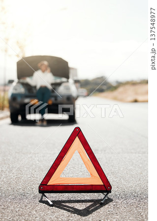 Car problem, stop sign or driver with stress or anxiety late from engine crisis on road or street. Blur, phone call or frustrated black woman talking by a stuck motor vehicle in emergency or accident 137548977