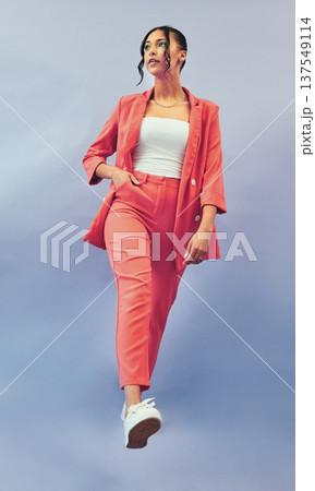 Business woman, thinking and corporate fashion with gen z style and trendy clothes for work. Studio, blue background and intern with worker confidence and career pride with stylish suit for job 137549114