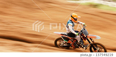 Motorcycle, speed and motion blur with a man training on space in the desert for dirt biking. Bike, fitness and sports with a person driving fast on an off road course for freedom or performance 137549219