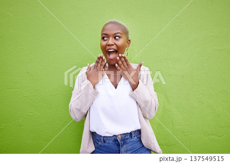 Excited, thinking and black woman surprise by news, deal or discount offer isolated in a studio green background. Wow, gossip and young person with emoji reaction to announcement or promotion 137549515