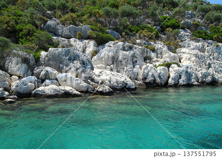 A small seaside town Antalya. Flooded ancient Lycian city as a result of the earthquake city. Near the city of Simena in the vicinity of Kekova Turkey. A small seaside town Antalya. Flooded ancient Lycian city as a result of the earthquake city. Near the city of Simena in the vicinity of Kekova Turkey. 137551795