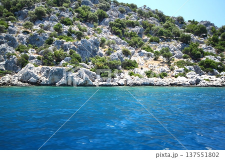 A small seaside town Antalya. Flooded ancient Lycian city as a result of the earthquake city. Near the city of Simena in the vicinity of Kekova Turkey. A small seaside town Antalya. Flooded ancient Lycian city as a result of the earthquake city. Near the city of Simena in the vicinity of Kekova Turkey. 137551802