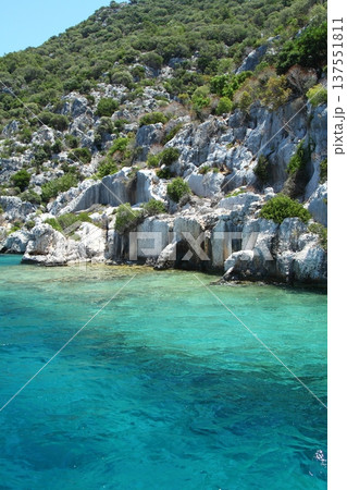 A small seaside town Antalya. Flooded ancient Lycian city as a result of the earthquake city. Near the city of Simena in the vicinity of Kekova Turkey. A small seaside town Antalya. Flooded ancient Lycian city as a result of the earthquake city. Near the city of Simena in the vicinity of Kekova Turkey. 137551811