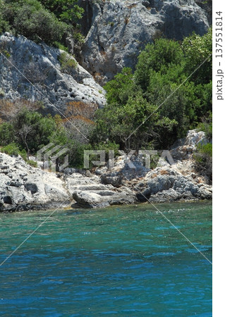 A small seaside town Antalya. Flooded ancient Lycian city as a result of the earthquake city. Near the city of Simena in the vicinity of Kekova Turkey. A small seaside town Antalya. Flooded ancient Lycian city as a result of the earthquake city. Near the city of Simena in the vicinity of Kekova Turkey. 137551814