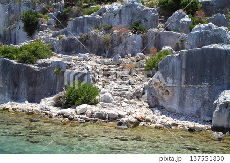 A small seaside town Antalya. Flooded ancient Lycian city as a result of the earthquake city. Near the city of Simena in the vicinity of Kekova Turkey. A small seaside town Antalya. Flooded ancient Lycian city as a result of the earthquake city. Near the city of Simena in the vicinity of Kekova Turkey. 137551830