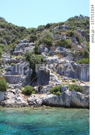 A small seaside town Antalya. Flooded ancient Lycian city as a result of the earthquake city. Near the city of Simena in the vicinity of Kekova Turkey. A small seaside town Antalya. Flooded ancient Lycian city as a result of the earthquake city. Near the city of Simena in the vicinity of Kekova Turkey. 137551834