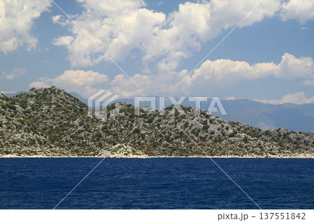 A small seaside town Antalya. Flooded ancient Lycian city as a result of the earthquake city. Near the city of Simena in the vicinity of Kekova Turkey. A small seaside town Antalya. Flooded ancient Lycian city as a result of the earthquake city. Near the city of Simena in the vicinity of Kekova Turkey. 137551842