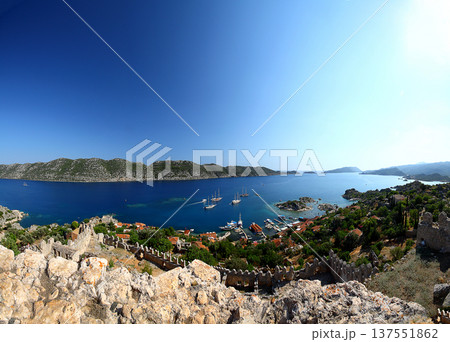 Simena (Kalekoy) ancient ruin site with sarcophagus by historic Simena castle, Turkey by Kekova islands. Simena (Kalekoy) ancient ruin site with sarcophagus by historic Simena castle, Turkey by Kekova islands. 137551862
