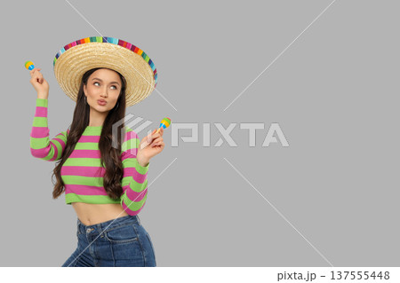 A young woman celebrates Cinco de Mayo joyfully 137555448