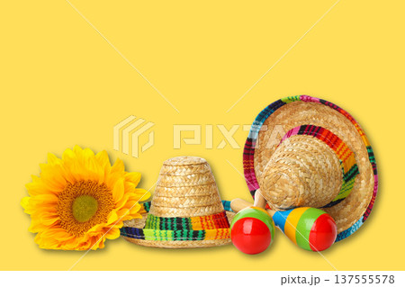 Cinco de Mayo, Festive hats, maracas, and a sunflower appear together Cinco de Mayo, Festive hats, maracas, and a sunflower appear together 137555578