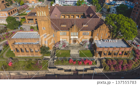 Historic brick school building surrounded by trees in Hong Kong March 8 2026 Historic brick school building surrounded by trees in Hong Kong March 8 2026 137555783