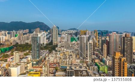 Kowloon City skyline with mountains under clear blue sky March 8 2026 Kowloon City skyline with mountains under clear blue sky March 8 2026 137555808