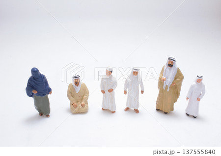 Miniature desert figures arranged in clean studio setting Miniature desert figures arranged in clean studio setting 137555840