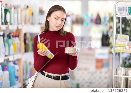 woman chooses paste for the tree woman chooses paste for the tree 137556271