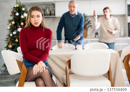 Men quarreling with girl 137556809