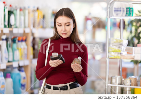 Young woman choosing perfume Young woman choosing perfume 137556864