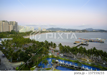SANYA, CHINA - JANUARY 25, 2026. Sunrise over Dadonghai Bay on tropical Hainan Island in China 137559233