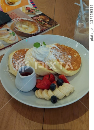 Fluffy souffle pancakes with a light, airy texture, served with fresh fruits, whipped cream, or syrup. These soft, melt-in-your-mouth pancakes are a delightful, indulgent treat perfect. Fluffy souffle pancakes with a light, airy texture, served with fresh fruits, whipped cream, or syrup. These soft, melt-in-your-mouth pancakes are a delightful, indulgent treat perfect. 137559553