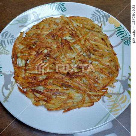 Golden-brown gamja jeon, a classic Korean potato pancake, crispy on the outside and tender inside. Simple yet flavorful, it's a comforting snack or side dish to enjoy anytime. Golden-brown gamja jeon, a classic Korean potato pancake, crispy on the outside and tender inside. Simple yet flavorful, it's a comforting snack or side dish to enjoy anytime. 137560633