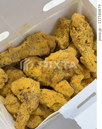 Crispy fried chicken with golden, crunchy skin and juicy, tender meat. A delicious and savory dish, perfect for any meal, served with dipping sauces or side dishes for extra flavor! 137560674