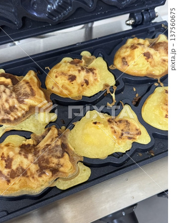 Bungeoppang, bungeo-ppang (Korean Fish Shaped Pastry), popular snack, cookies, sweet in winter streets of Korea. Bungeoppang Korean traditional national food, dish, cuisine. Japanese taiyaki 137560675