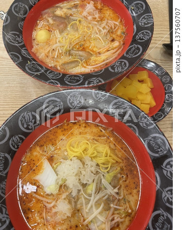 Malatang, a flavorful Chinese street food featuring a spicy and numbing Sichuan broth filled with customizable ingredients like meat, seafood, vegetables, and tofu. A warm and bold culinary experience 137560707