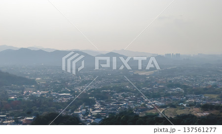 Pat Heung rural valley stretching beneath distant hazy mountains March 7 2026 Pat Heung rural valley stretching beneath distant hazy mountains March 7 2026 137561277