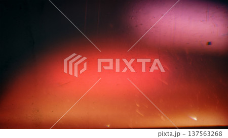 Abstract distressed film burn texture with warm light leak, scratches, dust 137563268