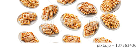 Multiple plates of golden waffles with creamy topping isolated on white background, concept of delicious breakfast food 137563436