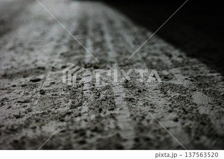 Car tire track in wet mud close-up texture Car tire track in wet mud close-up texture 137563520