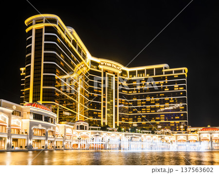 Beautiful night view of Wynn Palace Performance Lake displays a water, music, and light show, is a hotel casino resort on the Cotai Strip in Macau, China. Beautiful night view of Wynn Palace Performance Lake displays a water, music, and light show, is a hotel casino resort on the Cotai Strip in Macau, China. 137563602
