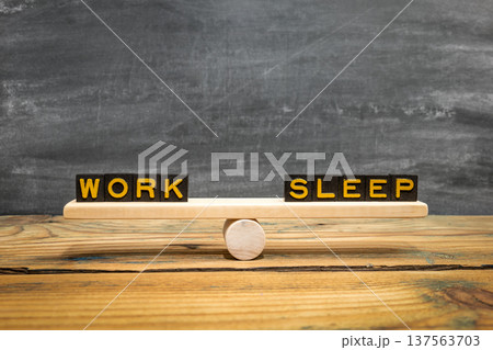 WORK SLEEP Wooden Seesaw Illustrating Daily Time Allocation 137563703