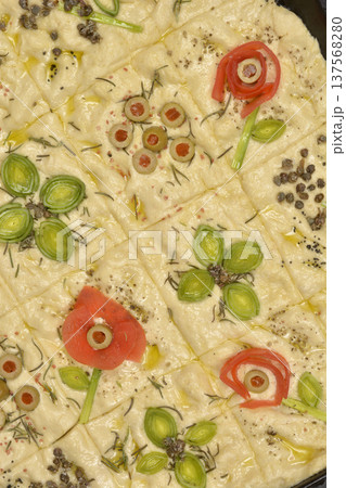 Floral garden focaccia bread art with vegetables Floral garden focaccia bread art with vegetables 137568280