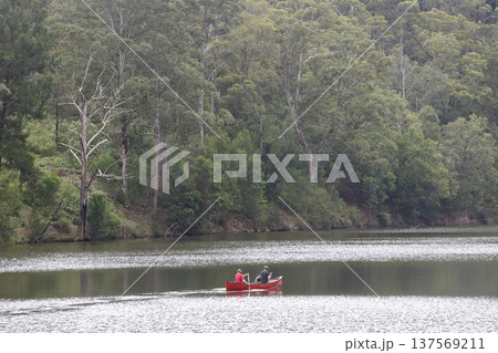 Couple kayaking in the Lake Yarrunga. Couple kayaking in the Lake Yarrunga. 137569211