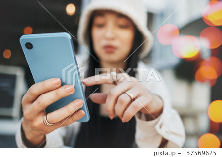Hands, travel and woman with phone at a cafe for social media, texting or chatting in a city. Smartphone, app and lady influencer at coffee shop for content creation, podcast or traveling blog post 137569625