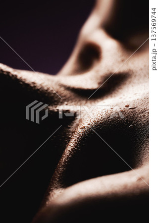Skin, water and a body closeup in studio for beauty, wellness or feminine hygiene and care. Luxury, aesthetic and skincare with a person in the salon during sweat or hydration treatment for health Skin, water and a body closeup in studio for beauty, wellness or feminine hygiene and care. Luxury, aesthetic and skincare with a person in the salon during sweat or hydration treatment for health 137569744