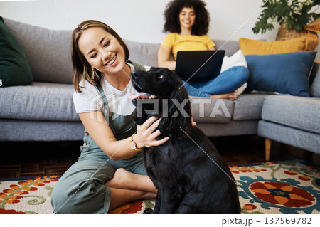 Pet, relax or happy woman with dog in house living room on floor to hug with trust, loyalty or love. Wellness, freedom or girl playing with an animal with care, support or kindness on mat at home Pet, relax or happy woman with dog in house living room on floor to hug with trust, loyalty or love. Wellness, freedom or girl playing with an animal with care, support or kindness on mat at home 137569782