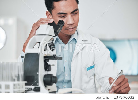 Scientist, microscope and man writing report, test results and research data for medical analysis of DNA in laboratory. Biotechnology, science and doctor with checklist, documents or healthcare study 137570032