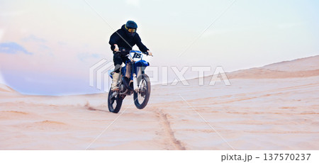 Sand, desert or athlete driving motorcycle for action, adventure or fitness with performance or adrenaline. Rally, sports or person on motorbike on dunes for training, exercise or race or challenge Sand, desert or athlete driving motorcycle for action, adventure or fitness with performance or adrenaline. Rally, sports or person on motorbike on dunes for training, exercise or race or challenge 137570237