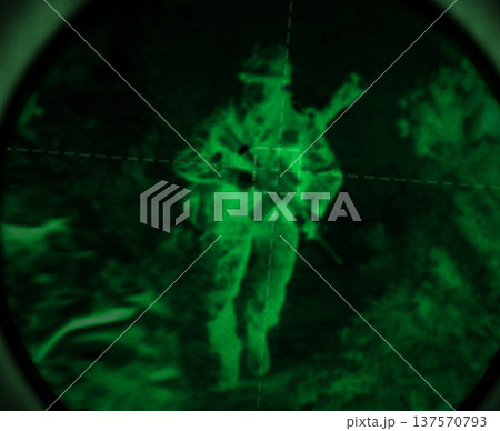 Dark, night vision and soldier in the military, war or mission for army with surveillance, security or agent of government. Green, man or person with overlay of sniper telescope view or enemy 137570793