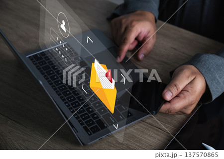 Business email security and phishing protection concept professional working on laptop alert envelope icon and authentication login screen email security 137570865
