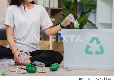 Recycling and Sustainability. Woman sorting plastic bottles for recycling. Recycling and Sustainability. Woman sorting plastic bottles for recycling. 137571138