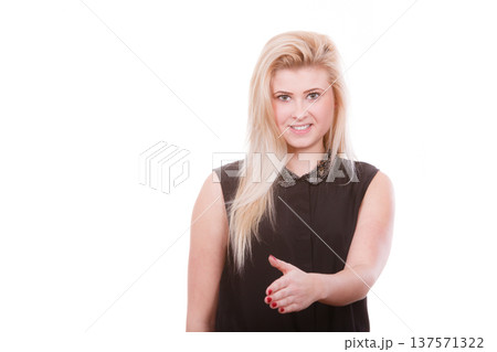 Woman with open hand ready for handshake Woman with open hand ready for handshake 137571322