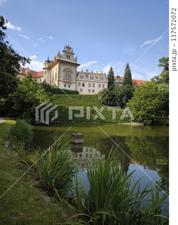 Scenic view of Pruhonice Castle in a sunny summer day with beautiful reflection in the pond, 137572072