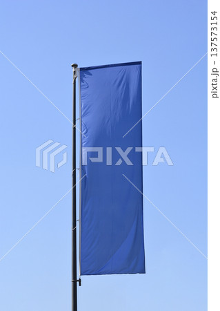 Blank Blue Vertical Banner on Flagpole Blank Blue Vertical Banner on Flagpole 137573154