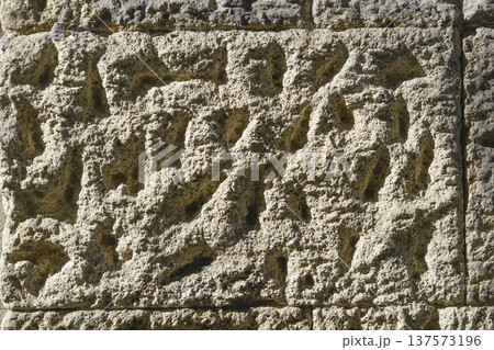 Weathered Texture of an Ancient Porous Stone Wall Weathered Texture of an Ancient Porous Stone Wall 137573196